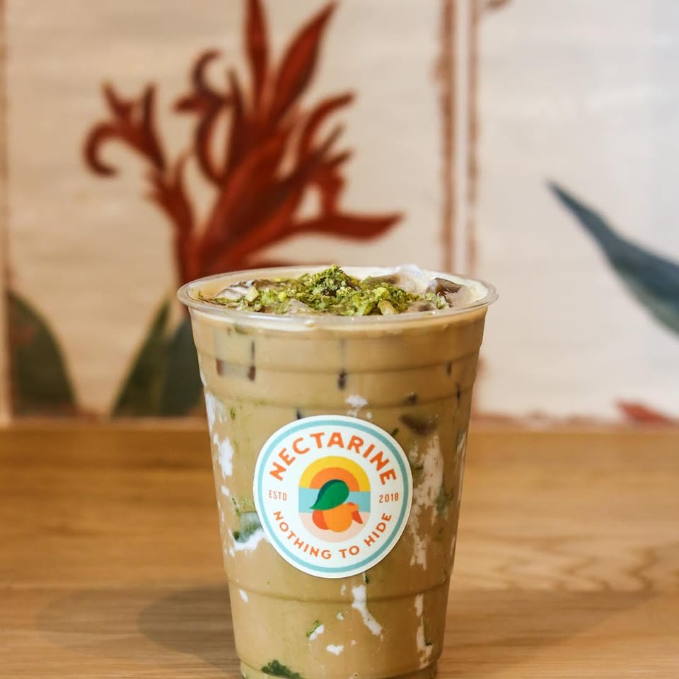 Iced pistachio drink in a Nectarine cup.